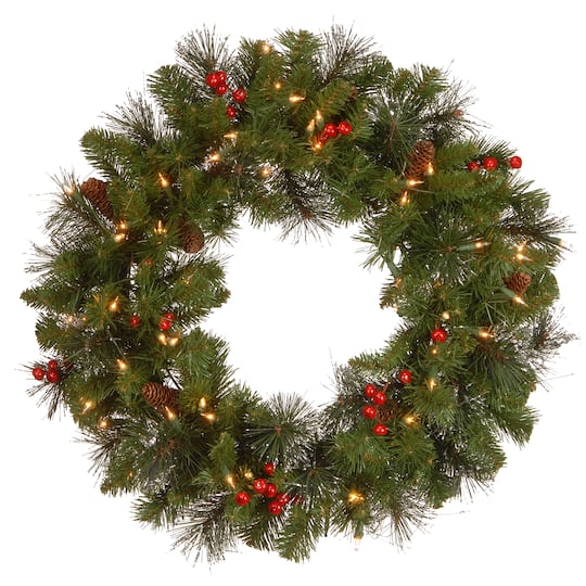 24&#x22; Crestwood&#xAE; Spruce Wreath with Silver Bristle, Pine Cones, Red Berries &#x26; Glitter with Clear Lights